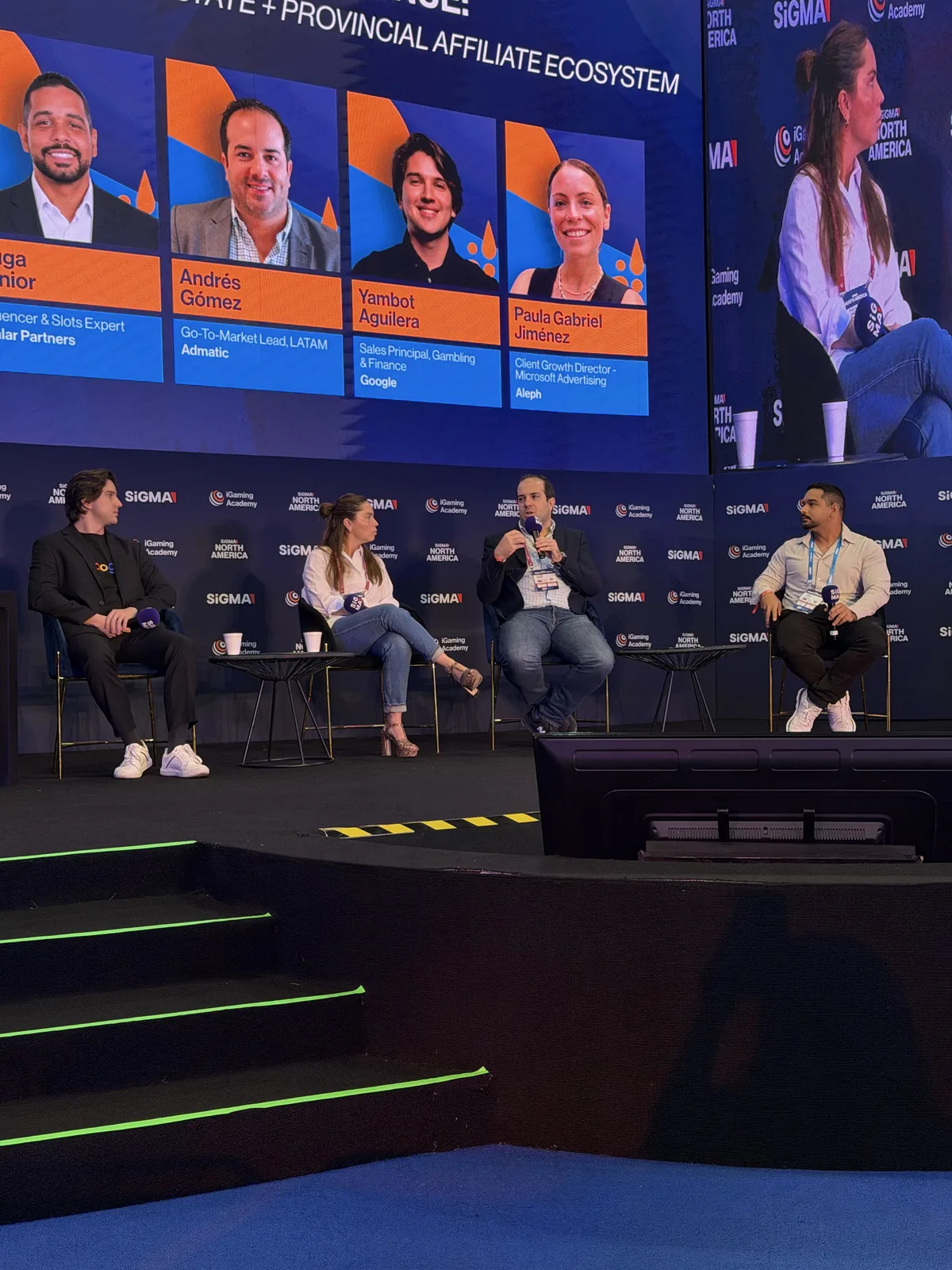 Guga Júnior durante painel sobre regulação e receita